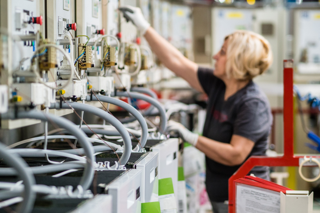 Factory worker working on production line