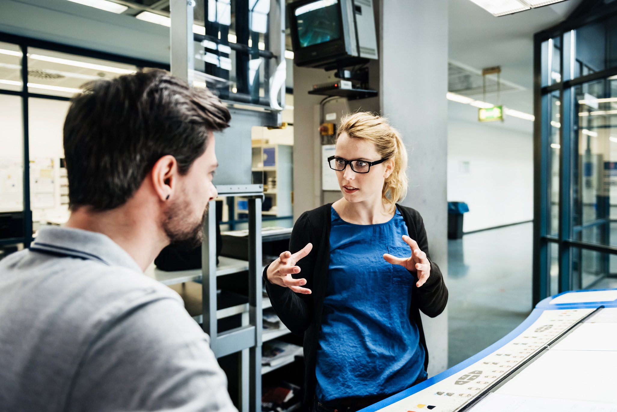 Factory Coworkers Discussing Project